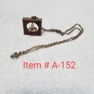 Necklace ,  A nice square necklace with 2 little bells in center,  Item # A-152